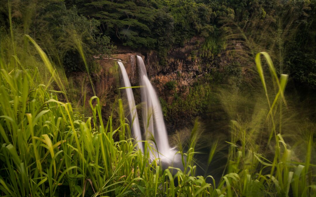 a-waterfall-going-into-the-wailua-river-on-kauai
