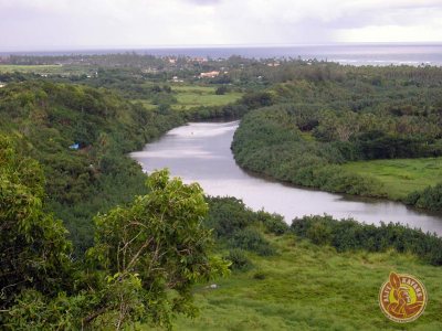 Wailua River with a lush green hillside